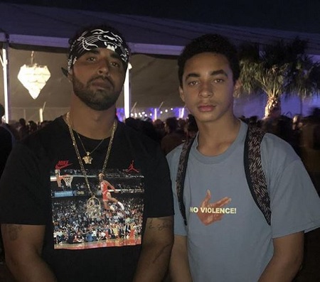  Daniel Julez J. Smith Jr (right) poses with his father Daniel Smith (left).